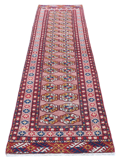 Tribal Hand Knotted Bokhara Bokhara Wool Rug of Size 2'4'' X 9'11'' in Peach and Red Colors - Made in Turkmenistan